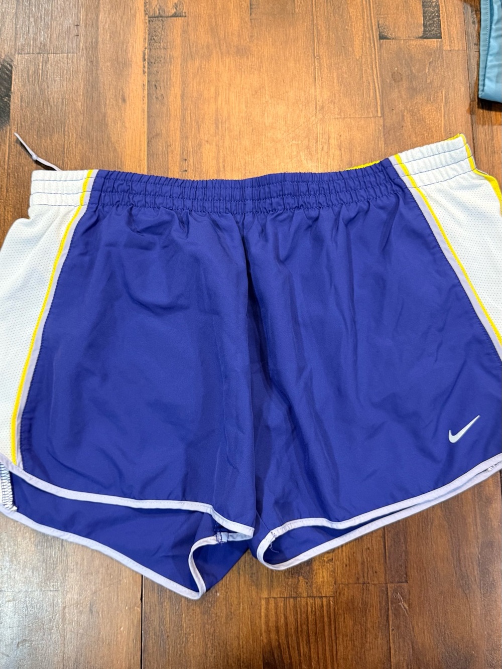 Nike Women's Royal Blue Athletic Shorts with White and Yellow Trim